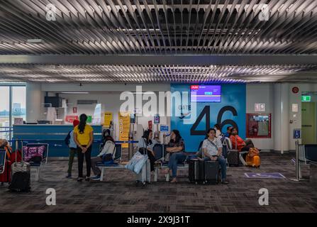 Una foto di un cancello d'imbarco all'Aeroporto Internazionale Don Mueang. Foto Stock