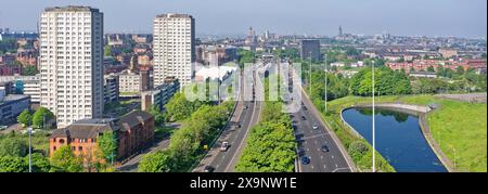 Vista aerea della città di Glasgow verso ovest sull'autostrada M8 Foto Stock