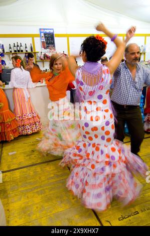 Signore alla fiera ippica di Jerez de la Frontera. Foto Stock