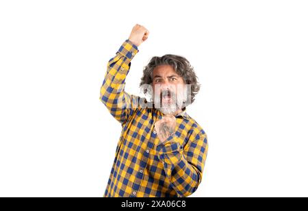 Un uomo di mezza età che alza trionfalmente i pugni per festeggiare Foto Stock