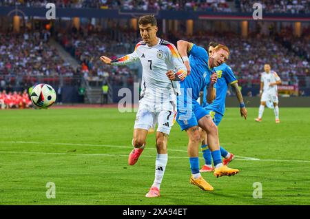 Kai Havertz, DFB 7 gareggiano per il pallone, tackle, duello, colpo di testa, zweikampf, azione, lotta contro Yukhym Konoplia, UKR 2 nella partita amichevole GERMANIA - UCRAINA 0-0 DEUTSCHLAND - UCRAINA in preparazione ai Campionati europei 2024 il 3 giugno 2024 a Norimberga, Germania. Fotografo: ddp Images/STAR-Images credito: ddp media GmbH/Alamy Live News Foto Stock