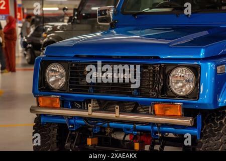 Retro Havoc 2024 è un evento annuale che celebra le auto d'epoca e d'epoca. L'evento si è svolto presso il parcheggio commerciale di The Curve. Auto di Suzuki. Foto Stock