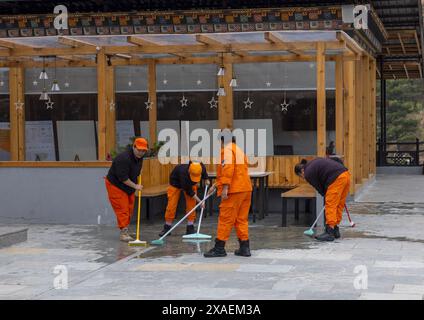 Lavoratori della Federazione del Bhutan, alias Guardiani della Pace, Chang Gewog, Thimphu, Bhutan Foto Stock