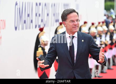 Saint Laurent Sur Mer, Francia. 6 giugno 2024. Il primo ministro dei Paesi Bassi Mark Rutte partecipa alla cerimonia commemorativa internazionale tenutasi a Omaha Beach in occasione del 80° anniversario dello sbarco degli Alleati in Normandia, a Saint-Laurent-sur-Mer, nella Francia nord-occidentale, il 6 giugno 2024. Foto di Jacques Witt/Pool/ABACAPRESS. COM credito: Abaca Press/Alamy Live News Foto Stock