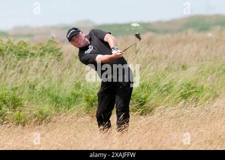 L' ex rugby gallese internazionale Ieuan Evans completa oggi la sfida a 100 buche al Royal Porthcawl Golf Club ( martedì 29 / 6 / 10 ) Foto Stock