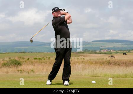 L' ex rugby gallese internazionale Ieuan Evans completa oggi la sfida a 100 buche al Royal Porthcawl Golf Club ( martedì 29 / 6 / 10 ) Foto Stock