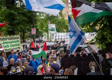 Swiss Cottage, Londra, 7 giugno 2024. Manifestazione pro palestinese con contro manifestazione pro israeliana “basta” che chiede alla polizia metropolitana di porre fine a tutte le marce pro palestinesi che sembrano sostenere il terrorismo di Hamas e la distruzione di Israele dall’inizio della guerra Israele/Hamas il 7 ottobre 2023. I sostenitori pro palestinesi al raduno sono stati i sostenitori pro israeliani. Crediti: Rena Pearl/Alamy Live News Foto Stock