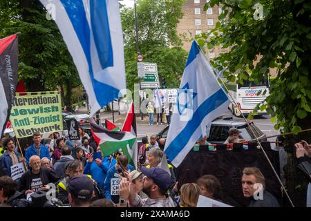 Swiss Cottage, Londra, 7 giugno 2024. Manifestazione pro palestinese con contro manifestazione pro israeliana “basta” che chiede alla polizia metropolitana di porre fine a tutte le marce pro palestinesi che sembrano sostenere il terrorismo di Hamas e la distruzione di Israele dall’inizio della guerra Israele/Hamas il 7 ottobre 2023. I sostenitori pro palestinesi al raduno sono stati i sostenitori pro israeliani. Crediti: Rena Pearl/Alamy Live News Foto Stock