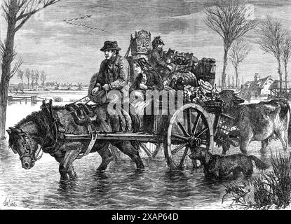 Allagato nel Lincolnshire, nel 1869. "La straordinaria quantità di pioggia che è caduta in gran parte dell'Inghilterra nelle ultime tre settimane ha causato il traboccare di molti fiumi e l'inondazione di estesi tratti di terra... nel Lincolnshire,...il Witham più di una volta si è innalzato sopra le sue rive in certi luoghi, e migliaia di acri di terra sono stati sommersi in diverse parti del paese. Qui e là una famiglia potrebbe essere vista in una situazione così scomoda come è rappresentata nella nostra incisione, costretta a partire dalla sua casa e a cercare un luogo asciutto di dimora temporanea. L'uomo e la moglie, con Foto Stock