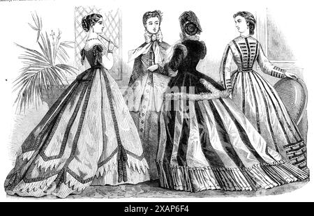 Moda parigina per dicembre 1865. "N. 1. Abito in taffeta a righe azzurre, rifinito con un nastro di tonalità più scura e pizzo a filo. La giacca è dotata di nodi a spalla e di una coda corta. Il copricapo è nello stile dell'Impero, con piccoli riccioli e una piccola corona di fiori muter. N. 2. Abito color lavanda, in seta, lino o qualsiasi altro materiale di lana. Il cofano è la nuova forma della Pamela ed è in velluto verde, con tende di tulle. Nella parte superiore di un lato c'è un uccellino. All'interno è presente una fascia di treccia d'argento con rosetta fissata sul velluto. N. 3. Vesti o Foto Stock