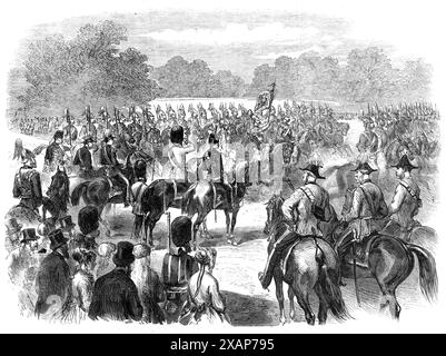 La Parata delle guardie alle guardie a cavallo in onore del compleanno della Regina, 1869. "L'ispezione delle guardie a piedi... ha avuto luogo nella Parata, St. James's Park [a Londra]...l'intera brigata era composta dal terzo battaglione Granatieri; il primo e il secondo battaglione Coldstream; e il primo e il secondo battaglione fucilieri scozzesi...Un distaccamento delle 2nd Life Guards era a terra...il Comandante in Capo, Feldmaresciallo il Duca di Cambridge, cui parteciparono il Colonnello James Macdonald e il Colonnello Clifton, arrivarono puntualmente a terra alle dieci, accompagnati dal Principe Teck. Il Foto Stock