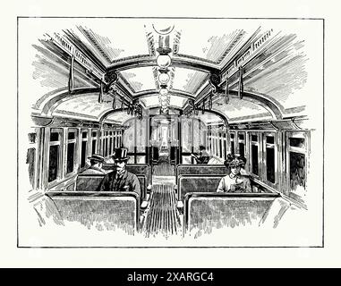 Un'antica incisione dell'interno di un vagone ferroviario sotterraneo della Central London Railway, Londra, Inghilterra, Regno Unito c.1900. È tratto da un libro di storia vittoriana del 1900 circa. La Central London Railway (CLR), nota anche come Twopenny Tube, era una ferrovia sotterranea a "metro" aperta nel 1900. I tunnel e le stazioni della CLR formarono la sezione centrale della Central line della metropolitana di Londra. Foto Stock