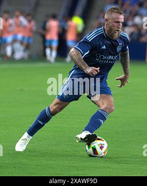 Kansas City, Kansas, Stati Uniti. 8 giugno 2024. L'attaccante sportivo del KC JOHNNY RUSSELL #7 conduce l'attacco durante la seconda metà della partita al Children's Mercy Park di Kansas City, Kansas, l'8 giugno 2024. (Credit Image: © Serena S.Y. Hsu/ZUMA Press Wire) SOLO PER USO EDITORIALE! Non per USO commerciale! Foto Stock