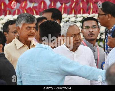 NUOVA DELHI, INDIA - 9 GIUGNO: Janata dal (United) leader NbiancaKumar ha visto insieme al leader del Partito Telugu Desam (TDP) N. Chandrababu Naidu durante la cerimonia di giuramento del primo ministro Narendra modi come primo ministro dell'India per il terzo mandato consecutivo durante la cerimonia di giuramento, a Rashtrapati Bhavan il 9 giugno 2024 a nuova Delhi, India. Narendra modi ha assunto il ruolo di primo ministro dell'India per un terzo mandato consecutivo in una cerimonia scintillante presso il piazzale di Rashtrapati Bhavan. Insieme al primo Ministro modi, un nuovo consiglio dei ministri ha giurato con 71 membri, segnato da una miscela di diversità ed exper Foto Stock