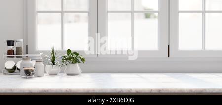 Un'immagine ravvicinata di un moderno piano di lavoro in marmo bianco presenta una tazza di caffè, piante decorative e un ripiano di condimento contro la finestra in una W Foto Stock