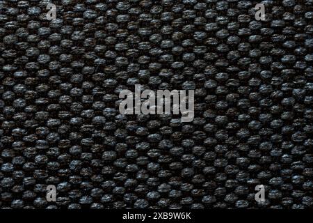 Tessuto nero ruvido, sfondo ricco di dettagli, foto macro ravvicinata Foto Stock