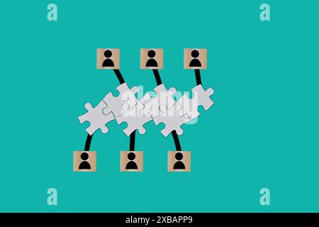 Assegnazione di obiettivi e obiettivi ai singoli individui in un processo aziendale separato su sfondo blu cartaceo Foto Stock