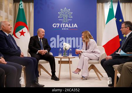 Savelletri di Fasano, Italia. 15 giugno 2024. Il presidente algerino Abdelmadjid Tebboune, ha lasciato, durante un incontro bilaterale con il primo ministro italiano Giorgia Meloni a margine del vertice del G7 presso il resort di Borgo Egnazia, 15 giugno 2024, a Savelletri di Fasano, Italia. Crediti: Presidenza del Consiglio/G7 Italia 2024/Alamy Live News Foto Stock