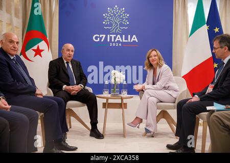 Savelletri di Fasano, Italia. 15 giugno 2024. Il presidente algerino Abdelmadjid Tebboune, ha lasciato, durante un incontro bilaterale con il primo ministro italiano Giorgia Meloni a margine del vertice del G7 presso il resort di Borgo Egnazia, 15 giugno 2024, a Savelletri di Fasano, Italia. Crediti: Presidenza del Consiglio/G7 Italia 2024/Alamy Live News Foto Stock