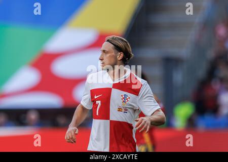 Berlino, Germania. 15 giugno 2024. Lovro Majer di (Croazia) visto in azione durante la partita di UEFA Euro 2024 tra le squadre nazionali di Spagna e Croazia all'Olympiastadion. Punteggi finali Spagna 3:0 Croazia. (Foto di Maciej Rogowski/SOPA Images/Sipa USA) credito: SIPA USA/Alamy Live News Foto Stock