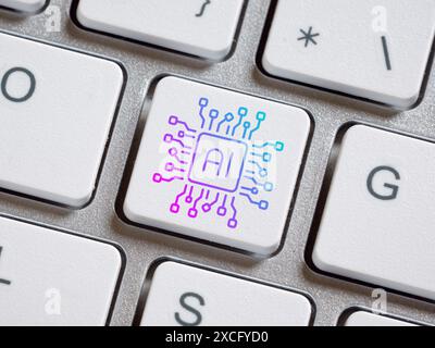 Concetto di intelligenza artificiale. Apprendimento automatico e tecnologie informatiche. Tastiera per computer con pulsante intelligenza artificiale ai. Foto Stock