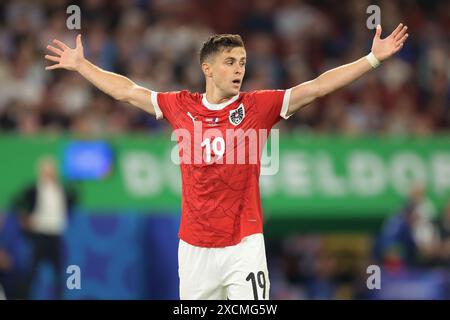 Dusseldorf, Germania. 17 giugno 2024. Christoph Baumgartner dell'Austria reagisce durante la partita dei Campionati europei UEFA alla Dusseldorf Arena di Dusseldorf. Il credito per immagini dovrebbe essere: Jonathan Moscrop/Sportimage Credit: Sportimage Ltd/Alamy Live News Foto Stock