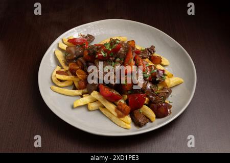 vitello in salsa con patatine fritte Foto Stock