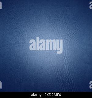 Texture in pelle blu in una vignetta e con un effetto luminoso Foto Stock