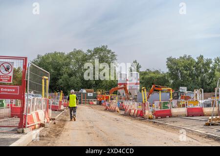 Cantiere edile in uso per una grande impresa edile, Regno Unito. Foto Stock