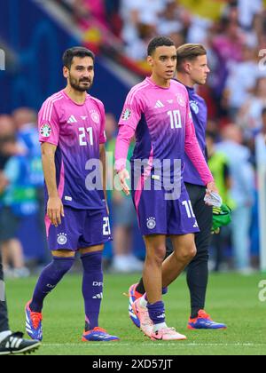 Ilkay Guendogan, DFB 21 Jamal Musiala, DFB 10 dopo il match della fase a gironi GERMANIA, Ungheria. , . Il 19 giugno 2024 a Stoccarda, Germania. Fotografo: ddp Images/STAR-Images credito: ddp media GmbH/Alamy Live News Foto Stock