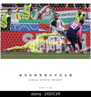 Pechino, Cina. 19 giugno 2024. Jamal Musiala (1° R) della Germania segna un gol durante la partita UEFA Euro 2024 di gruppo A tra Germania e Ungheria a Stoccarda, Germania, il 19 giugno 2024. Crediti: Philippe Ruiz/Xinhua/Alamy Live News Foto Stock