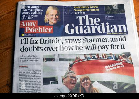 "Risolverò la Gran Bretagna, promette (Keir) Starmer, tra i dubbi su come pagherà" testata del quotidiano Guardian 14 giugno 2024 Londra Inghilterra Regno Unito Foto Stock