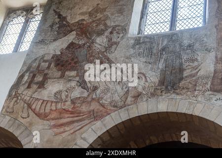 Dipinti murali medievali affreschi nella chiesa di San Pietro e San Paolo a Pickering, North Yorkshire, Inghilterra, Regno Unito. Pittura di San Giorgio e San Cristoforo Foto Stock