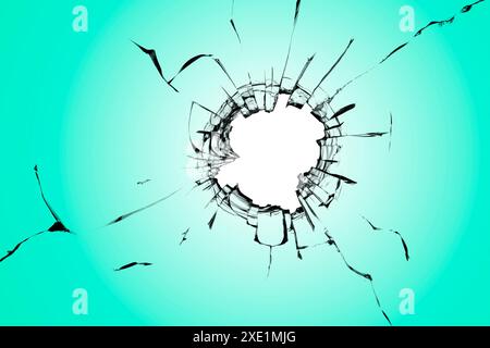 Un foro nel vetro con sfondo turchese, una finestra rotta da vandali. Effetto di distruzione. Texture creativa per il design. Foto Stock