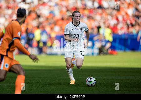 Berlino, Germania. 25 giugno 2024. Patrick Wimmer (23) dell'Austria visto durante la partita di UEFA Euro 2024 nel gruppo D tra Paesi Bassi e Austria all'Olympiastadion di Berlino. Credito: Gonzales Photo/Alamy Live News Foto Stock