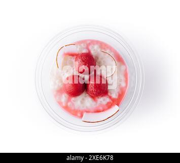 Dessert dolce budino di cocco con ciliegie Foto Stock