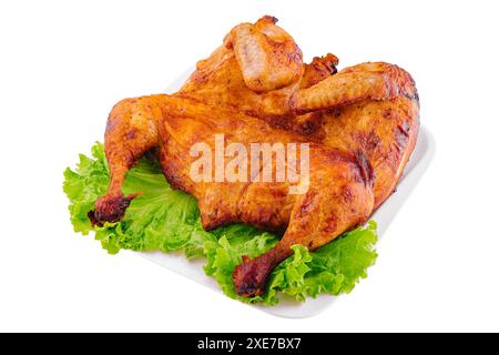 Pollo arrosto servito su un piatto bianco Foto Stock