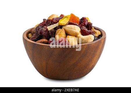 Vista ravvicinata della colazione, mescolare frutta secca e frutta in una ciotola di legno. Foto Stock