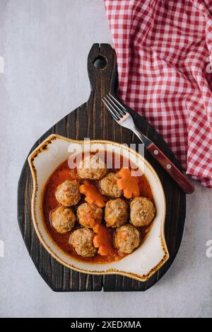 Le polpette di carne in agrodolce di sugo di pomodoro Foto Stock