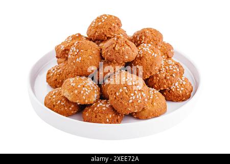 biscotti dolci con semi di sesamo nel piatto Foto Stock