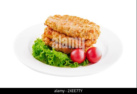 cotolette di pollo appena sfornate sul piatto Foto Stock