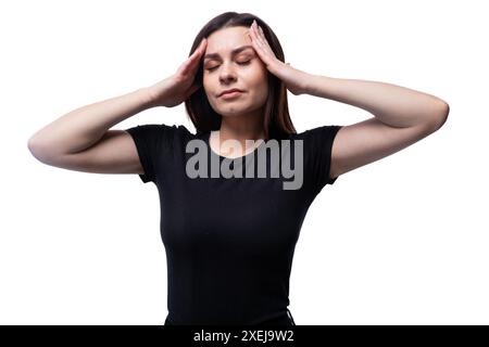 La giovane donna calma si rilassa con gli occhi chiusi Foto Stock