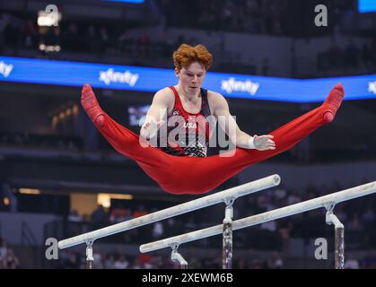 29 giugno 2024: Joshua Karnes gareggia sulle barre parallele durante la 2024 ginnastica U.S. Olympic Trials Men's Day 2 al Target Center di Minneapolis, Minnesota. Kyle Okita/CSM Foto Stock