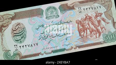 Banconota da 500 afghani stampata dall'Afghanistan, che mostra le armi di Bank con cavalieri, cavalieri in competizione a Buzkashi Foto Stock