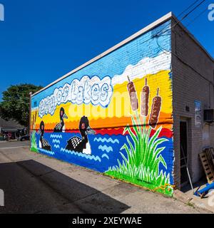 Il team di progetto META DI Brookita Corazon e Kid Quam dipinse il murale della città dei laghi il 25 settembre 2022. Il murale si trova sul lato del Brya Foto Stock