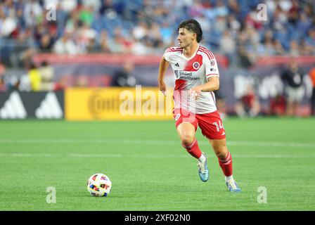 29 giugno 2024; Foxborough, ma, USA; Ian Harkes, centrocampista della New England Revolution (14) in azione durante il match MLS tra Columbus Crew e New England Revolution. Anthony Nesmith/CSM Foto Stock