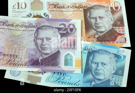Le prime banconote da £5, £10 & £20 con il ritratto di re Carlo III emesse nel Regno Unito nel giugno 2024 Foto Stock