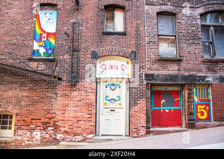 New Brunswick Canada, 1878, teatro dei burattini e biglietteria murale nel centro di Saint John, New Brunswick, Canada Foto Stock