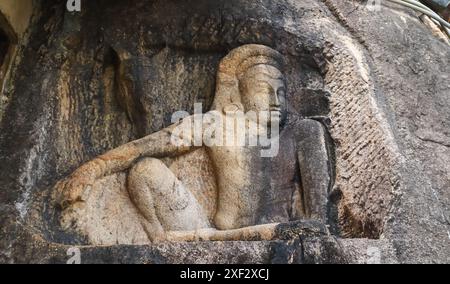 Scultura dell'uomo con cavallo, scultura nella roccia, tempio buddista Isurumuniya, città Sacra Patrimonio Mondiale dell'Umanità, Anuradhapura, Sri Lanka Foto Stock