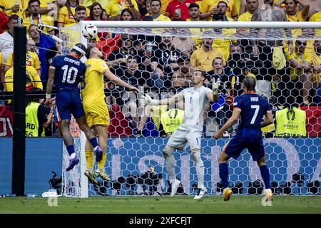 MONACO DI BAVIERA - Memphis Depay dell'Olanda, Radu Dragusin della Romania, il portiere della Romania Florin Nita e Xavi Simons dell'Olanda (l-r) durante il round di UEFA EURO 2024 del 16 tra Romania e Paesi Bassi alla Munich Football Arena il 2 luglio 2024 a Monaco di Baviera, Germania. ANP KOEN VAN WEEL Foto Stock